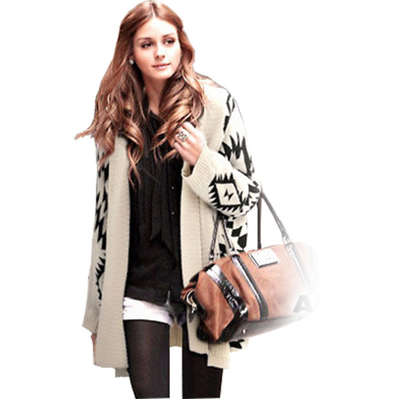 Poncho en tricot pour femmes avec un motif géométrique frappant Chic und Stil