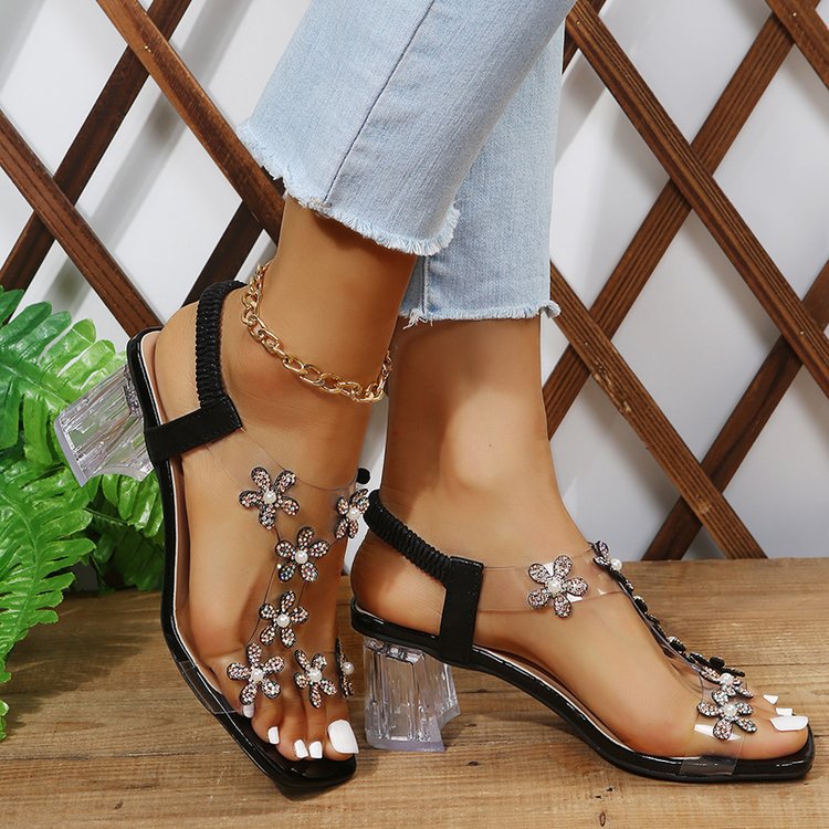 Sandales élégantes pour dames avec applications florales et talon transparent Chic und Stil