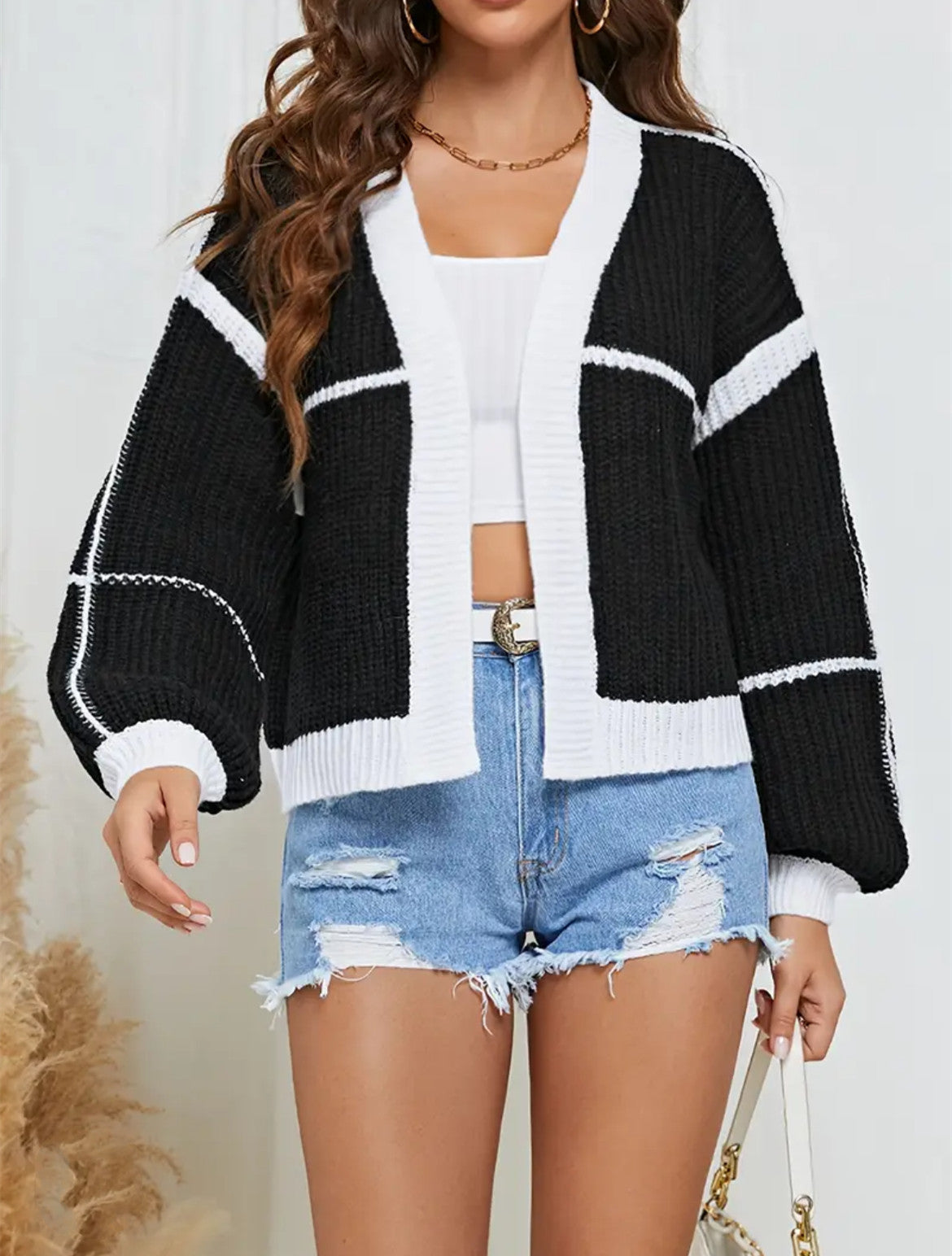 Casual knit cardigan for women with voluminous sleeves and a loose fit Chic and Style