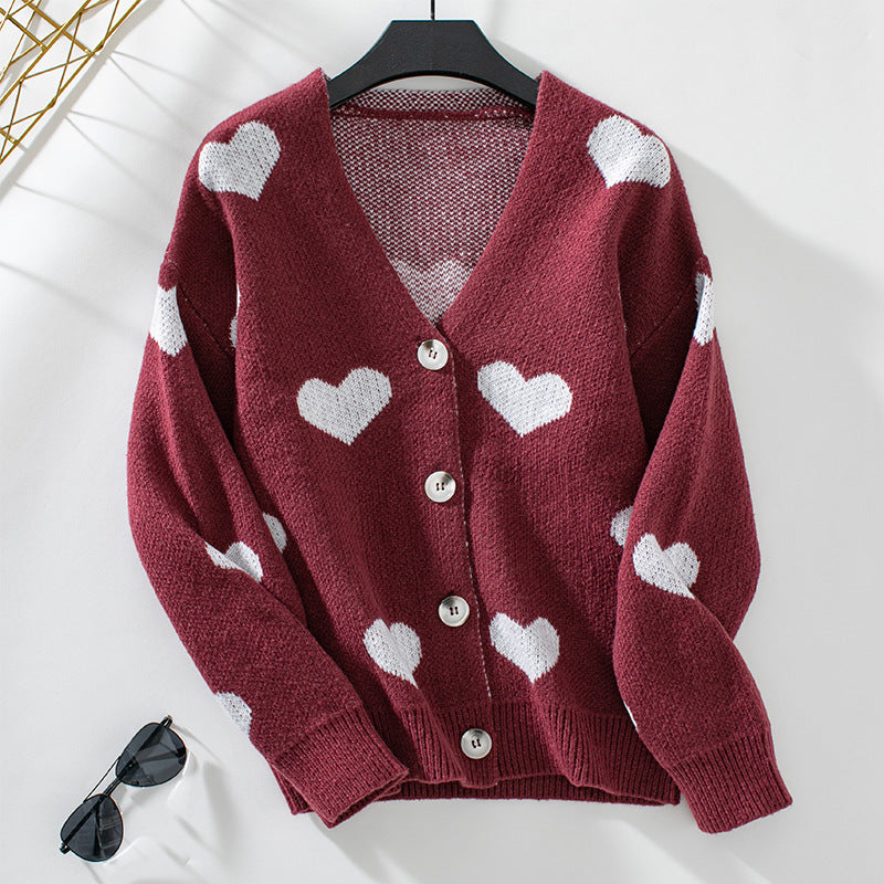 Veste en tricot mode pour femmes avec motifs de cœurs et boutons Chic und Stil