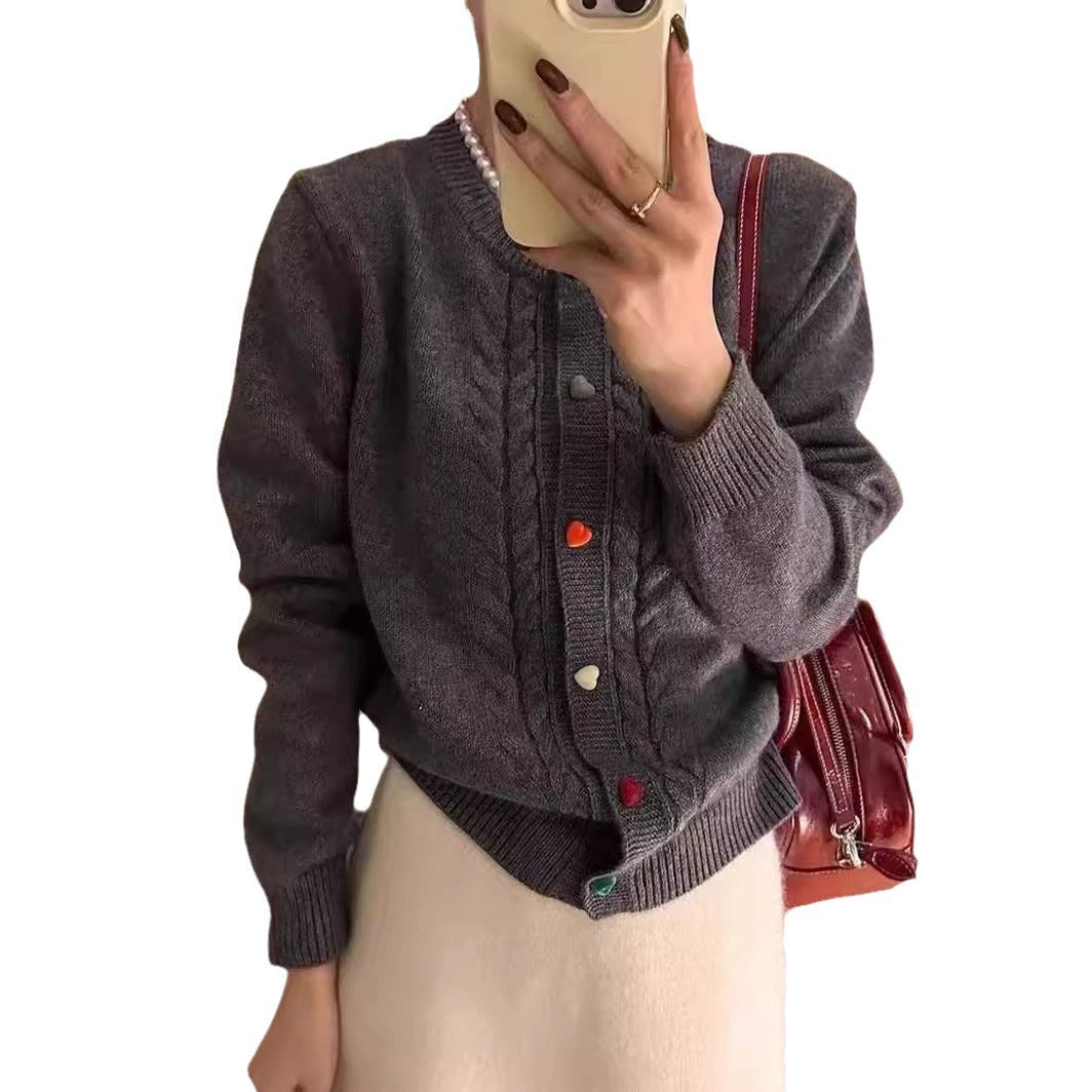 Cardigan pour femmes avec motif en relief et détails de boutons colorés Chic und Stil
