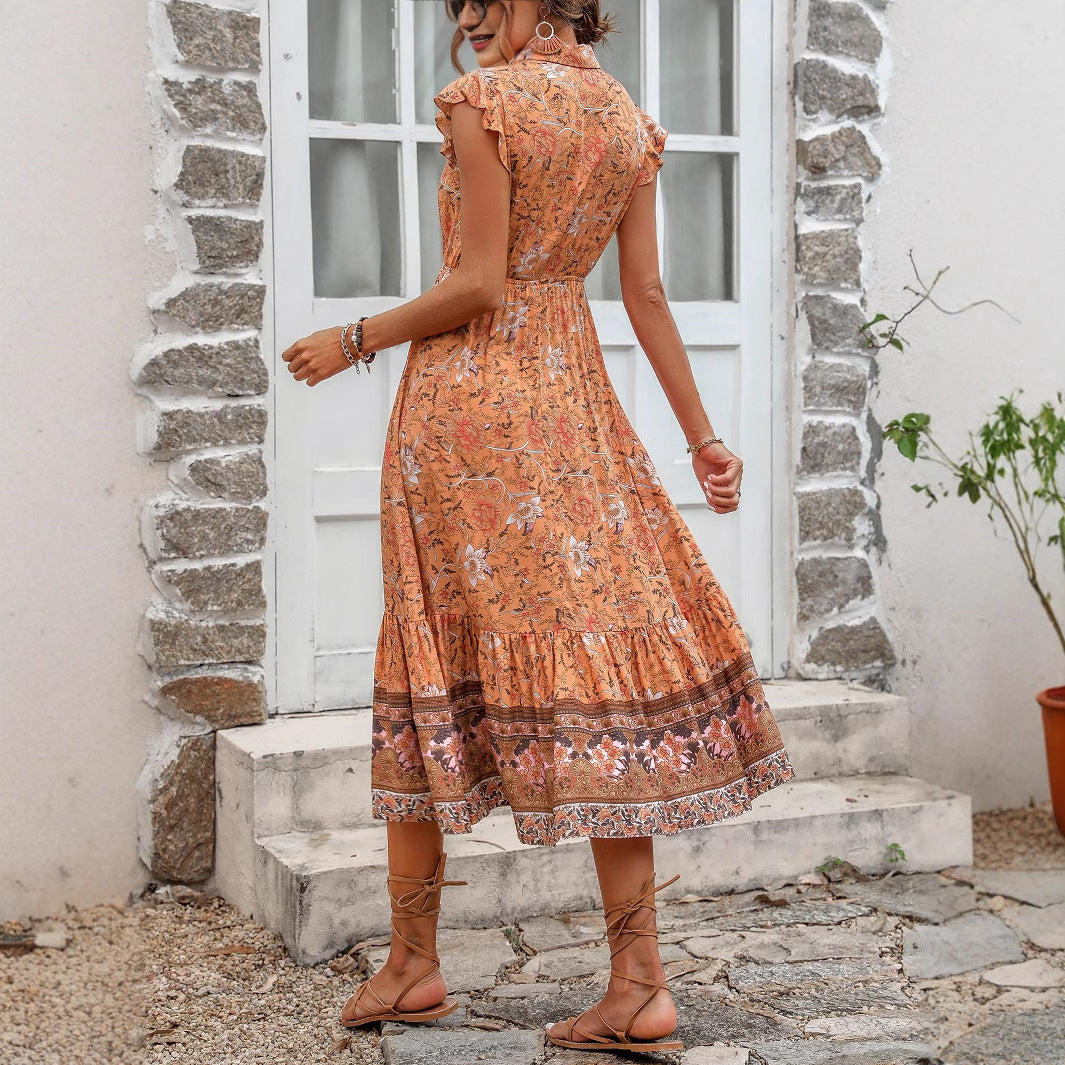 Robe midi pour dames avec des détails floraux en volants et une ceinture à nouer à la taille Chic und Stil