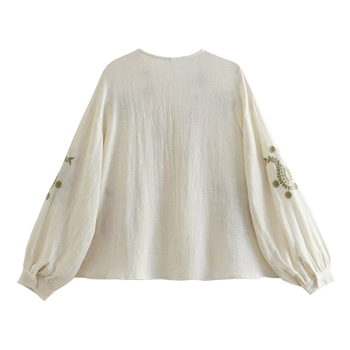 Blouse brodée pour femmes avec manches bouffantes et décolleté en V Chic und Stil