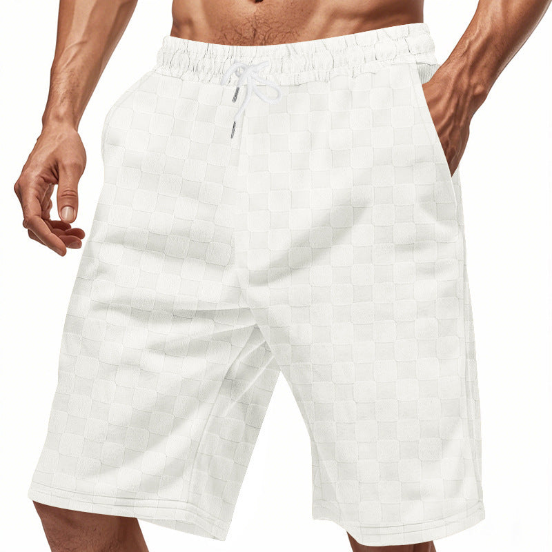 Shorts de plage décontractés pour hommes avec taille élastique et motif à carreaux moderne Chic und Stil