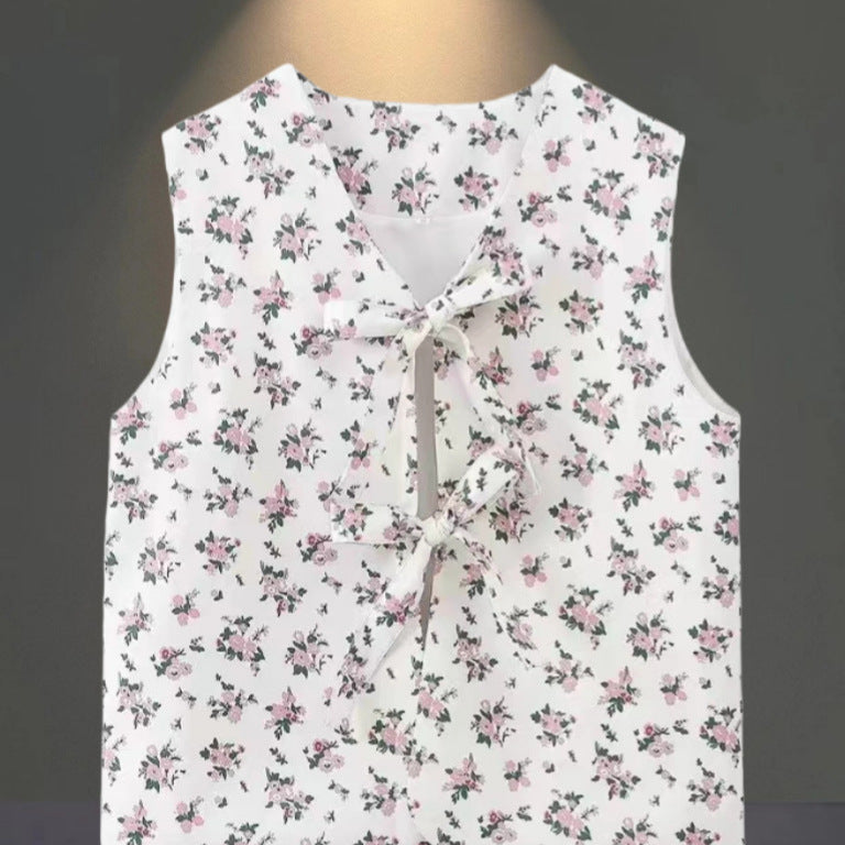 Robe sans manches pour femmes avec design floral et fermeture à nœud raffinée Chic und Stil