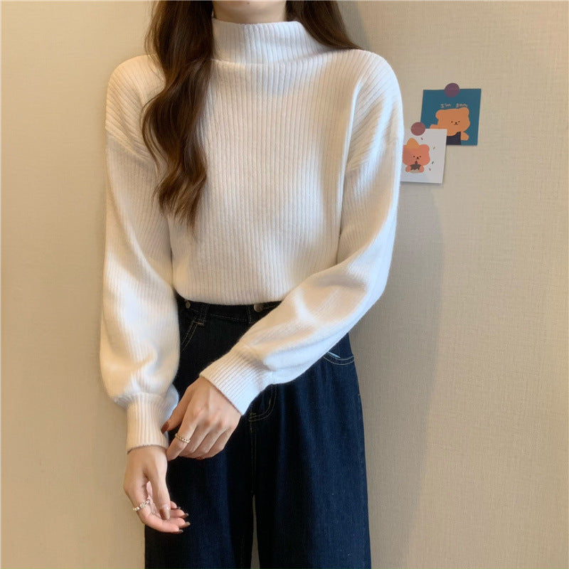 Pull femme tendance avec col montant et structure côtelée Chic und Stil