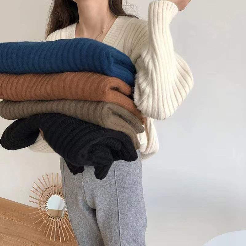Pull femme à col en V avec texture en côtes Chic und Stil