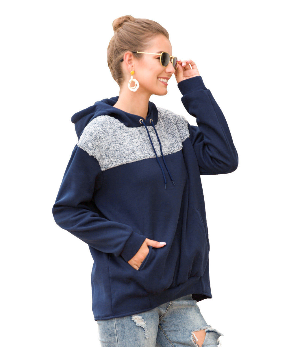 Pull à capuche pour femmes avec un design contrastant stylé et un ourlet élastique Chic und Stil