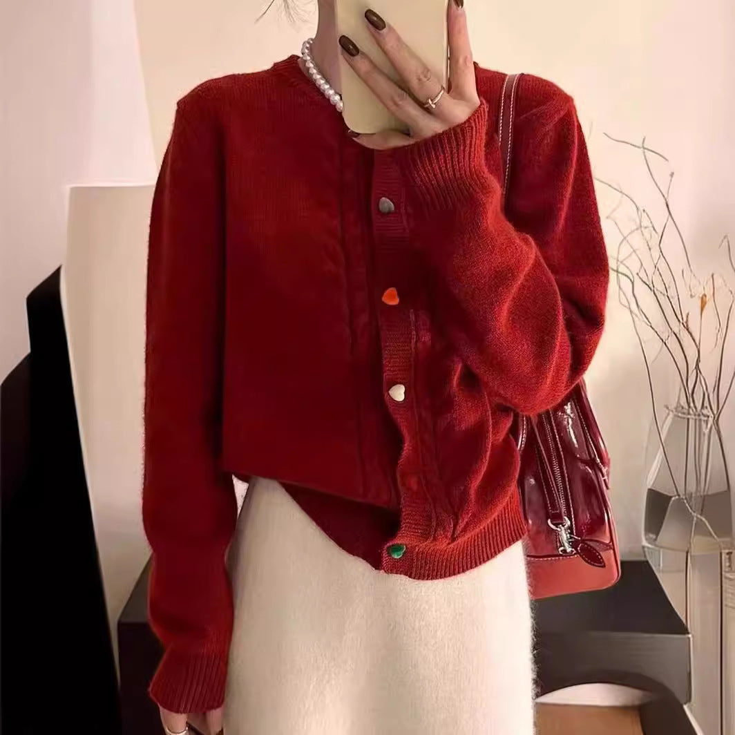 Cardigan pour femmes avec motif en relief et détails de boutons colorés Chic und Stil