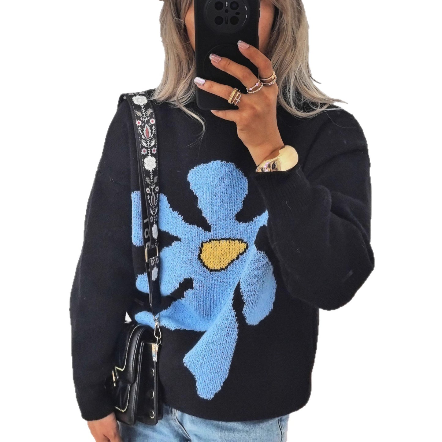Pull femme avec motif floral saisissant et coupe décontractée Chic und Stil