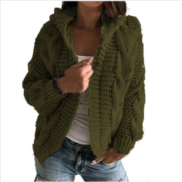 Women's chunky knit cardigan with open neck and voluminous sleeves. Chic and stylish.