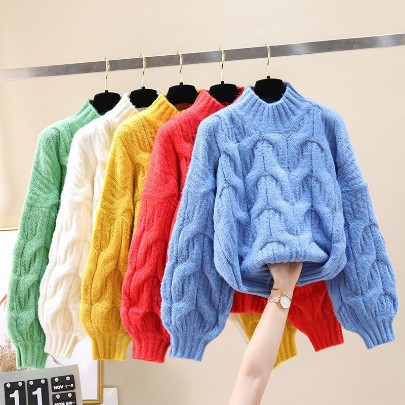 Pull en tricot confortable pour femmes avec des manches volumineuses et un motif torsadé Chic und Stil