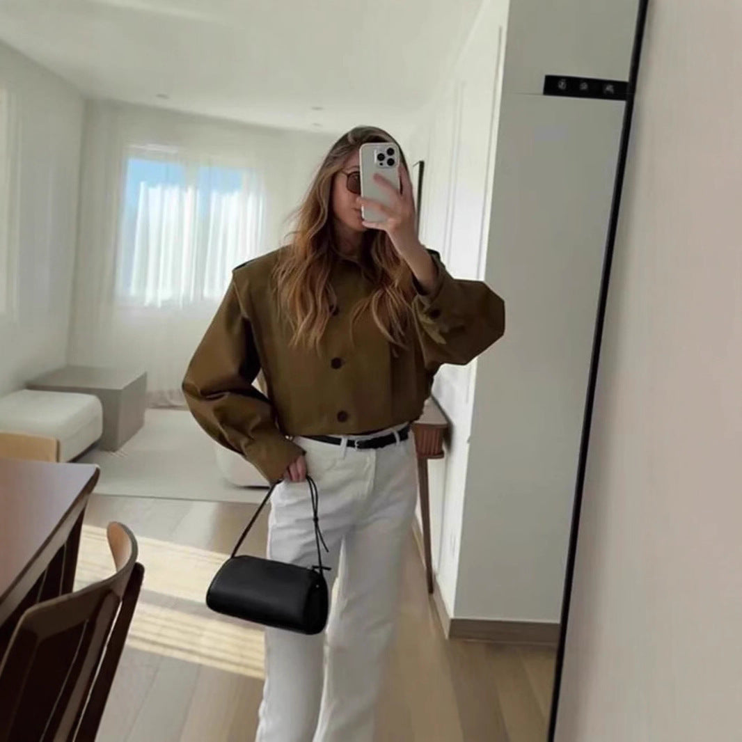 Blouse cintrée féminine à détails de boutons continus Chic und Stil