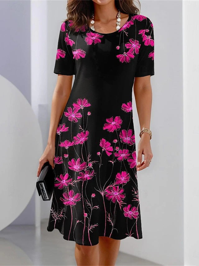 Robe midi femme avec un élégant motif floral et une silhouette décontractée Chic und Stil