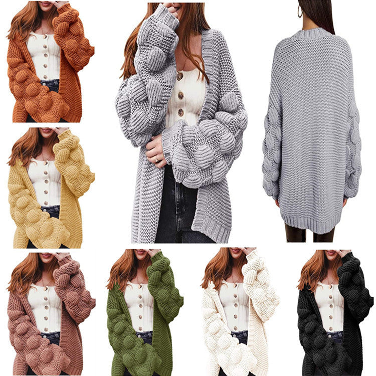 Veste en tricot pour femmes avec des manches bouffantes volumineuses et un aspect de maille structuré Chic und Stil