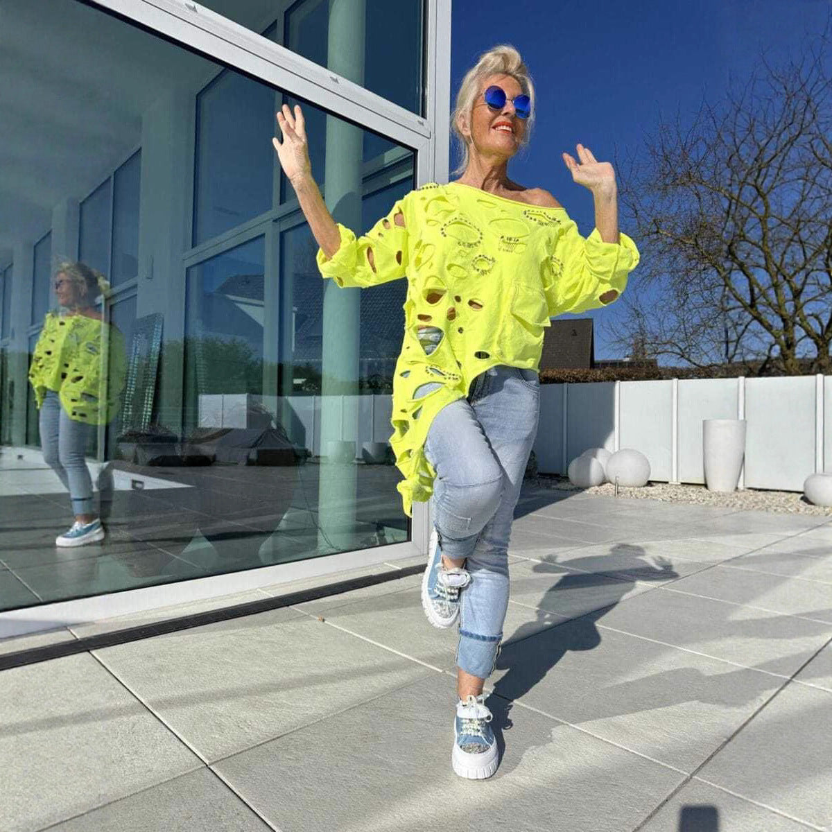 T-shirt oversized pour femmes avec des détails de déchirure tendance et une coupe décontractée Chic und Stil