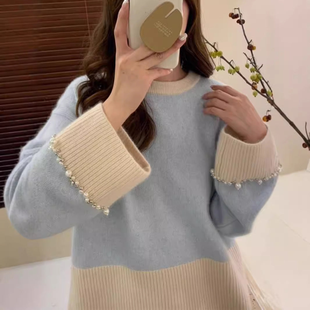 Pull en tricot à la mode pour femmes avec des manches ornées de perles Chic und Stil