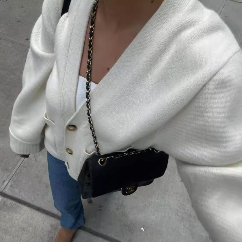 Cardigan féminin en tricot surdimensionné avec poches et décolleté en V Chic und Stil