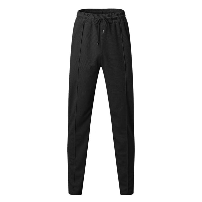 Pantalon de jogging sportif pour hommes avec taille élastique et poches zippées Chic und Stil