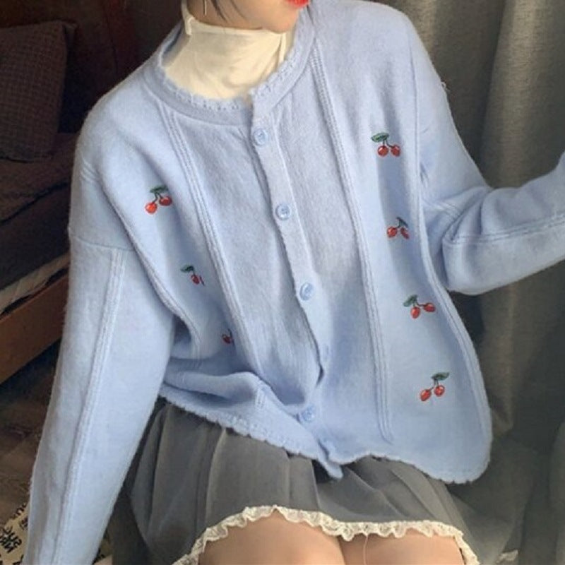 Cardigan pour femmes avec motif floral et fermeture à boutons Chic und Stil