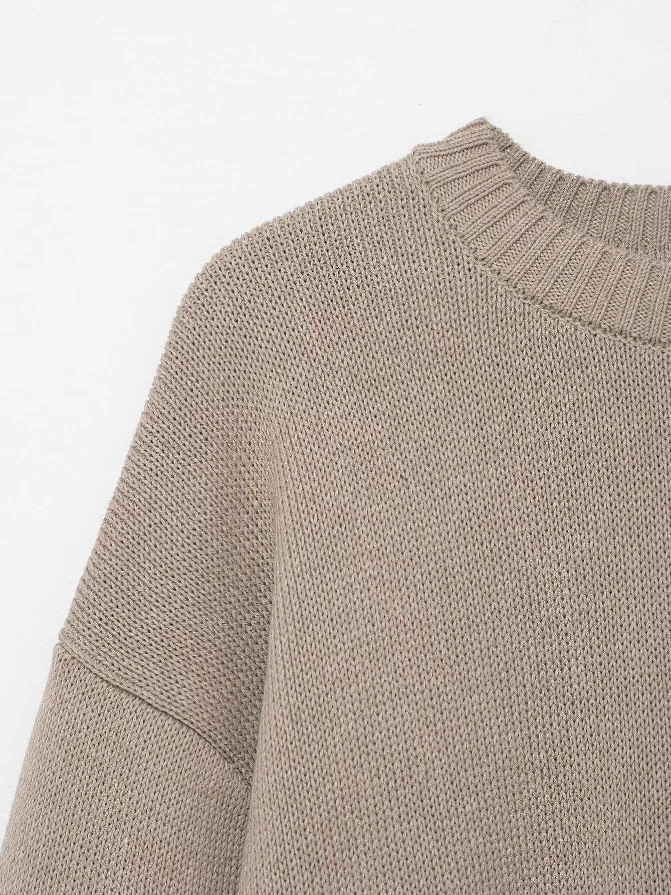 Pull en tricot décontracté pour femmes avec épaules tombantes et ourlet large Chic und Stil