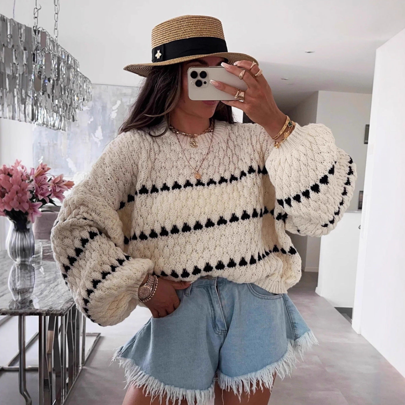 Pull en grosse maille pour femmes avec des manches volumineuses et un motif structuré Chic und Stil