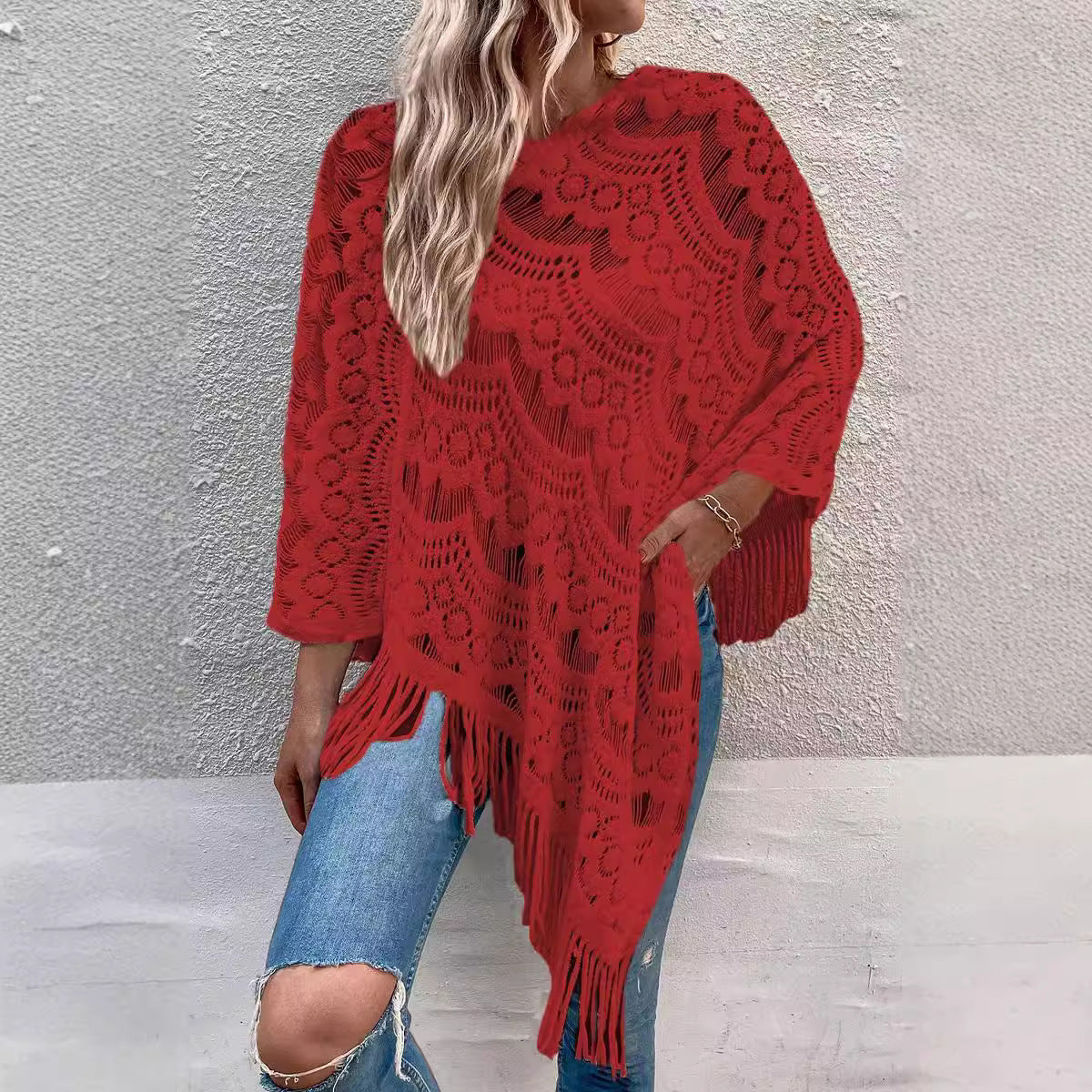 Poncho en tricot pour dames avec des motifs en crochet artistiques et des franges Chic und Stil
