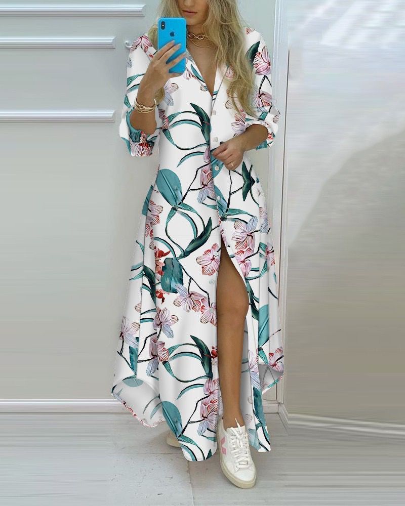 Robe chemise pour dames avec un motif de feuilles saisissant et des fentes latérales Chic und Stil