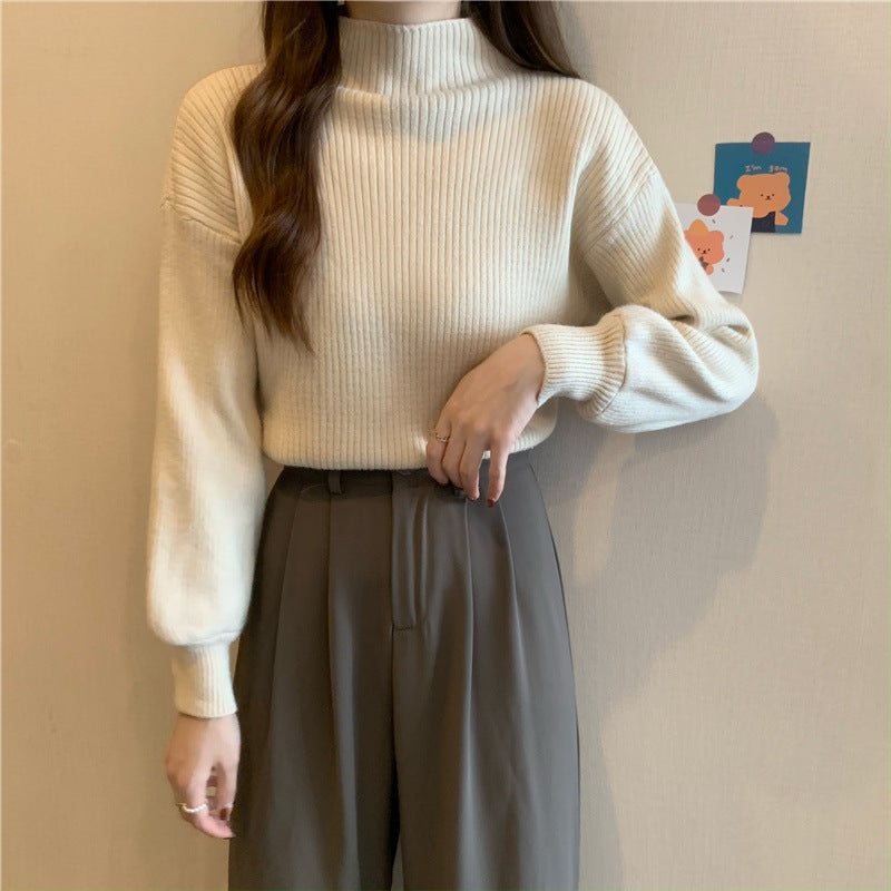 Pull femme tendance avec col montant et structure côtelée Chic und Stil