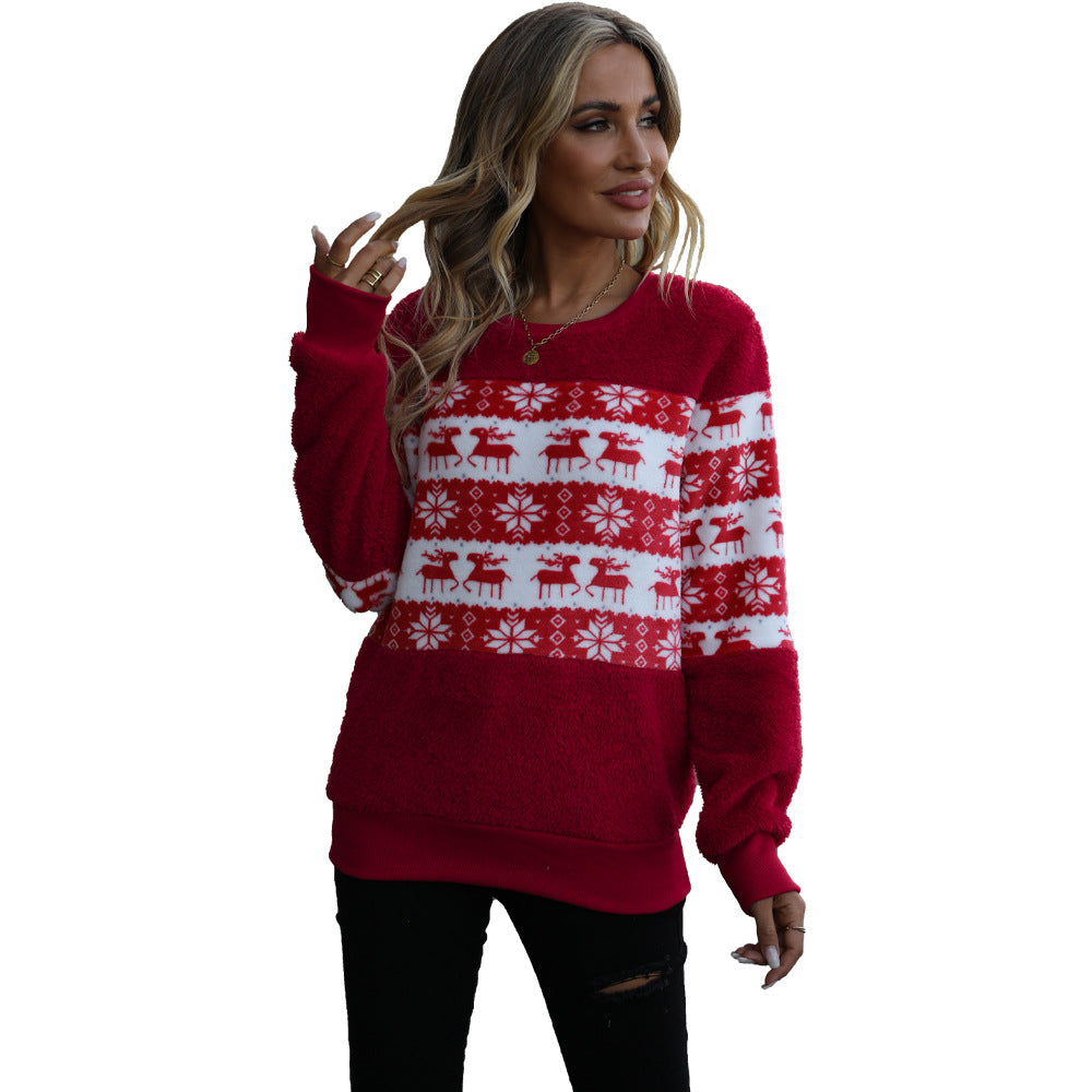 Pull femme douillet de Noël avec surface en flanelle et design festif Chic und Stil