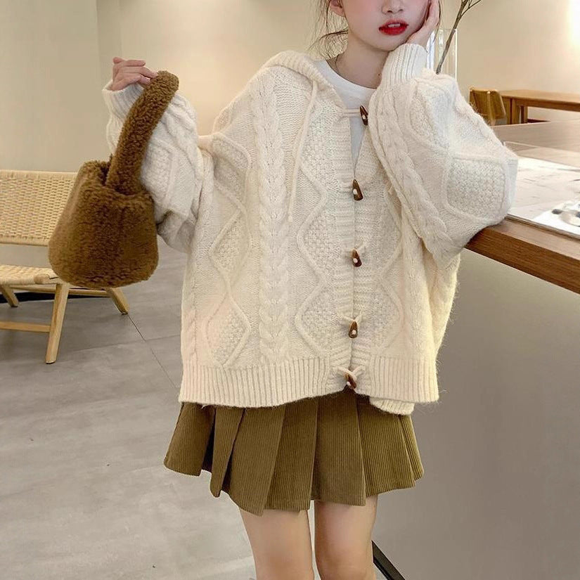 Cardigan surdimensionné pour femmes avec capuche et motif en tricot torsadé Chic & Stil