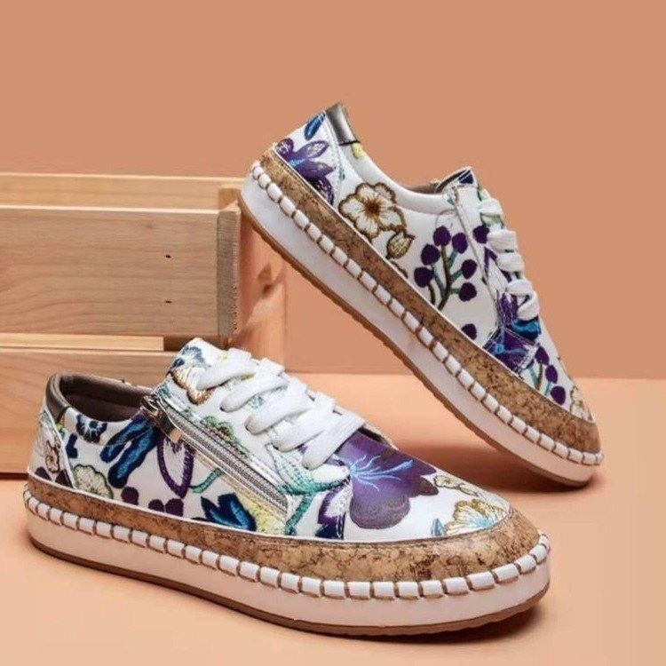Baskets féminines tendance avec motif floral et fermeture éclair pratique Chic und Stil