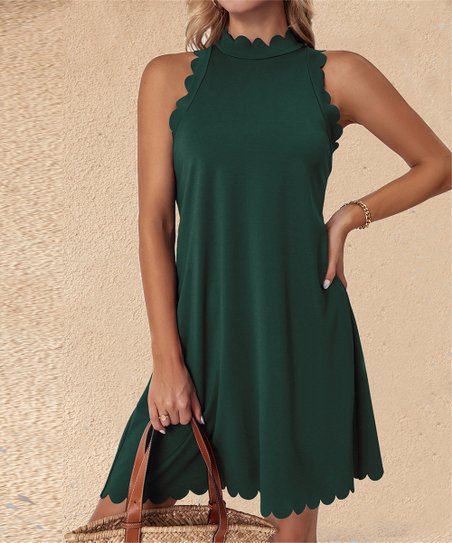 Robe sans manches pour femmes avec décolleté en scallop et coupe fluide Chic und Stil