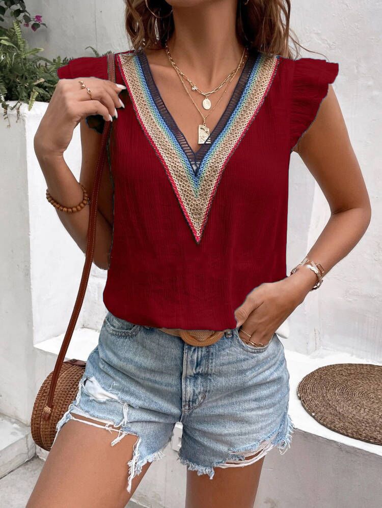 Chemisier brodé à col en V pour femmes avec des manches à volants Chic und Stil