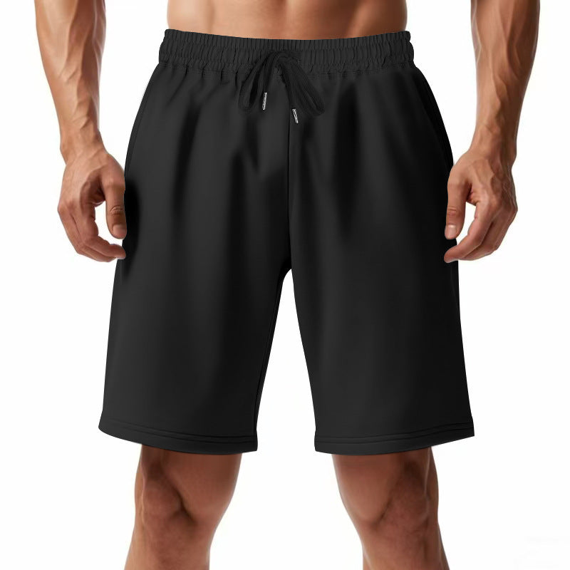 Pantalons de sport respirants pour hommes avec taille élastique et poches latérales Chic und Stil