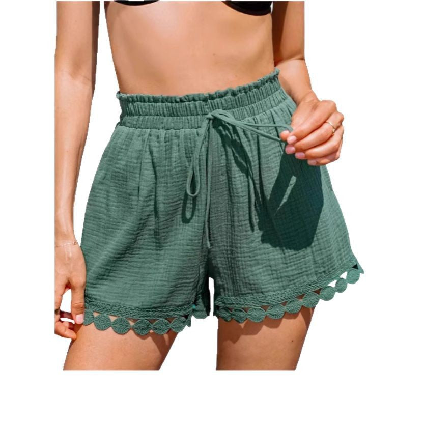 Shorts pour femmes Relaxed Fit en mélange de matériaux avec ourlet ondulé Chic und Stil