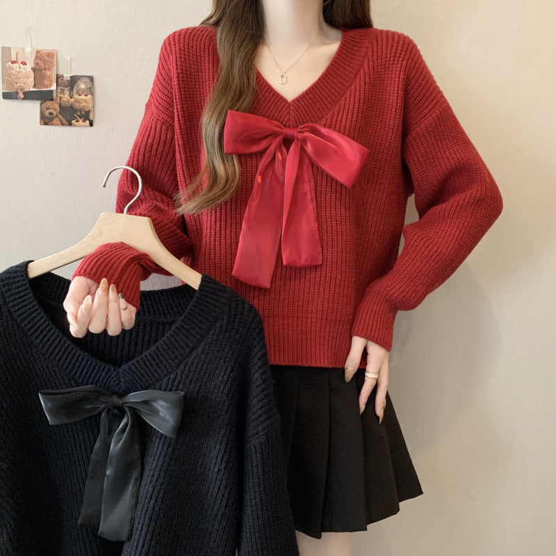 Pull en tricot pour femme avec décolleté en V et accent de nœud décoratif Chic und Stil