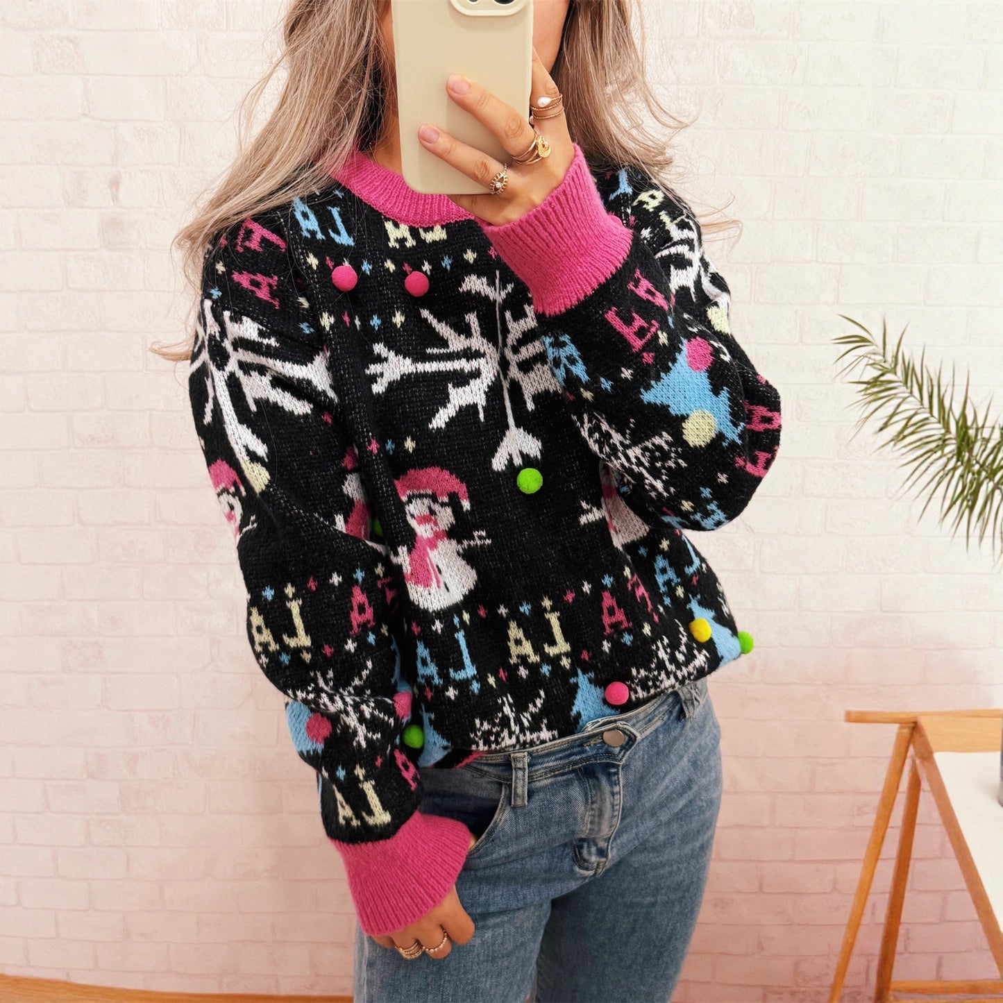 Pull élégant pour femmes avec des motifs de Noël colorés et des détails ludiques Chic und Stil