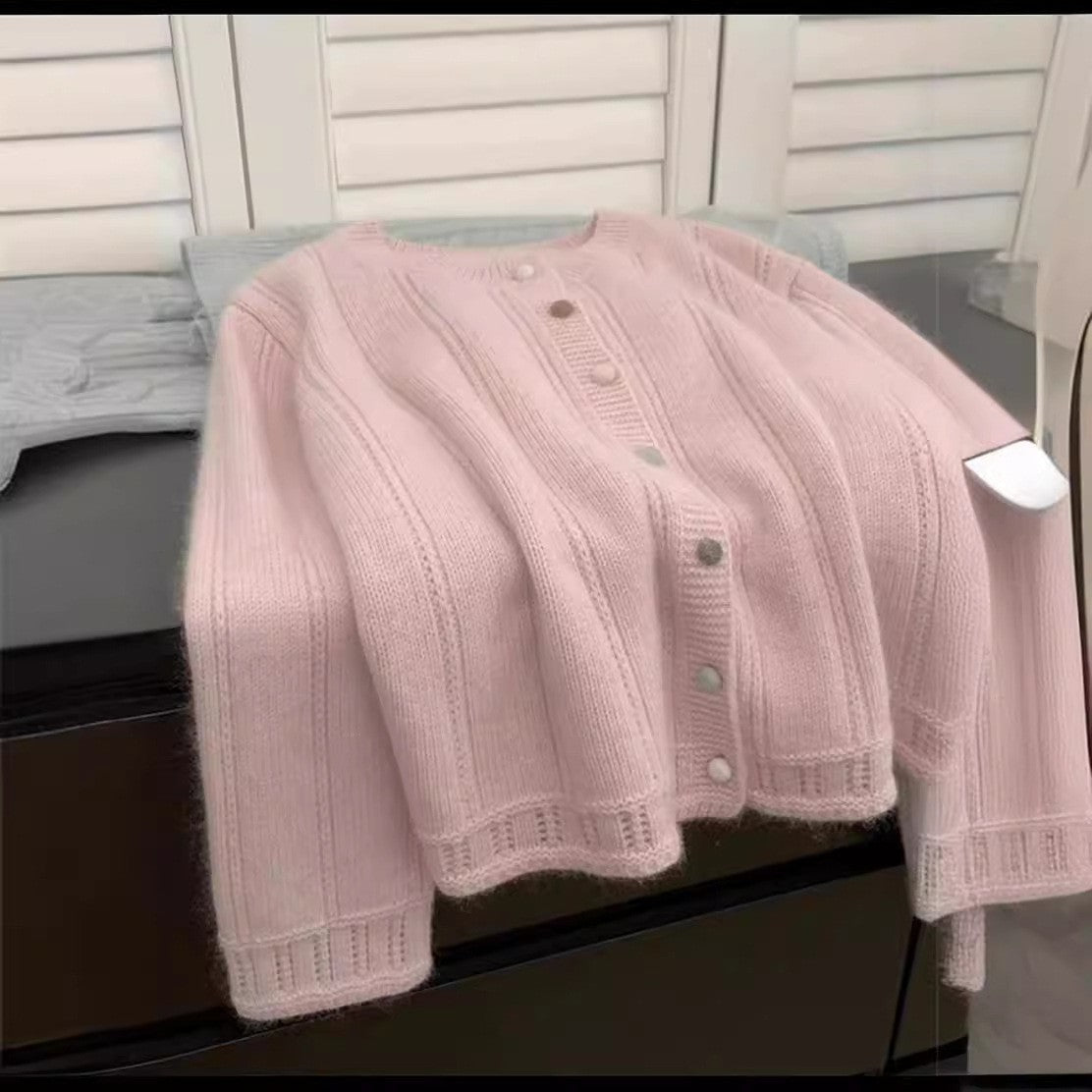Cardigan en gros tricot pour femmes avec une fermeture à boutons élégante et des manches larges Chic und Stil
