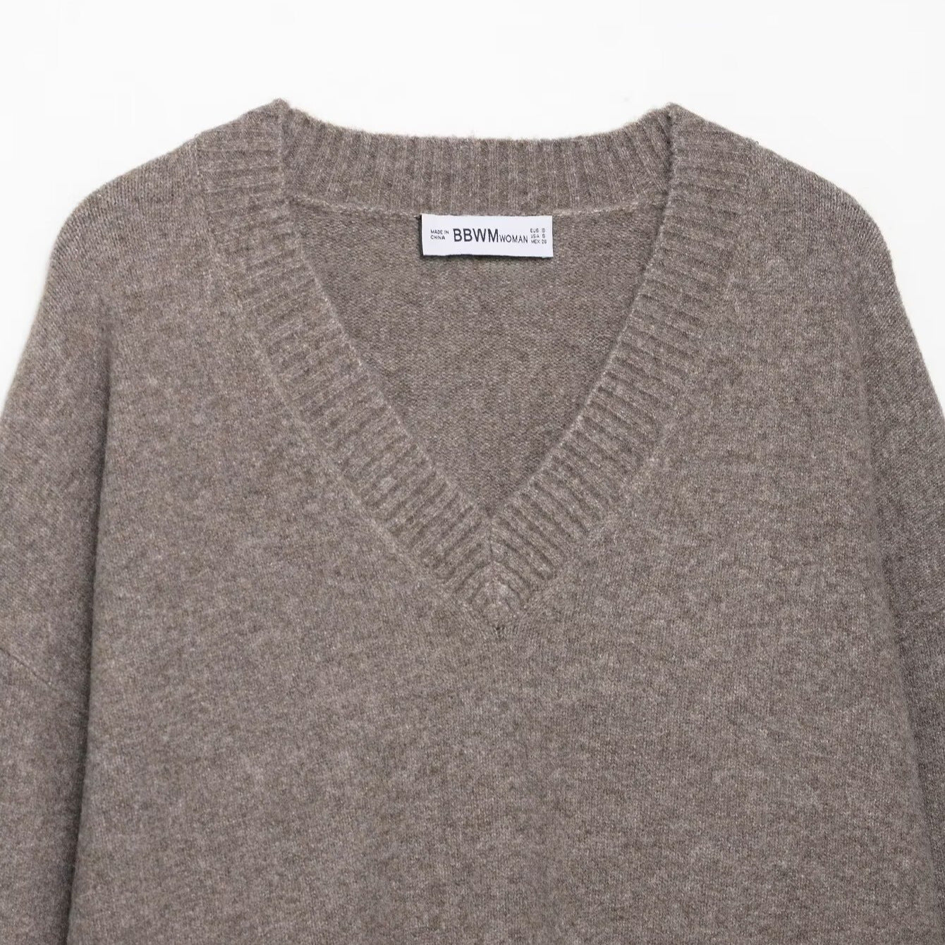 Pull élégant pour dames en V avec un col en laine fine Chic und Stil