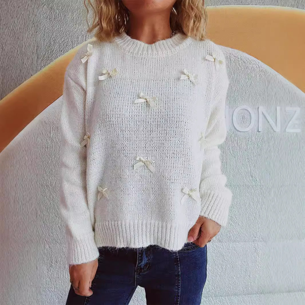 Pull en tricot pour femmes avec des accents de nœuds ludiques Chic und Stil