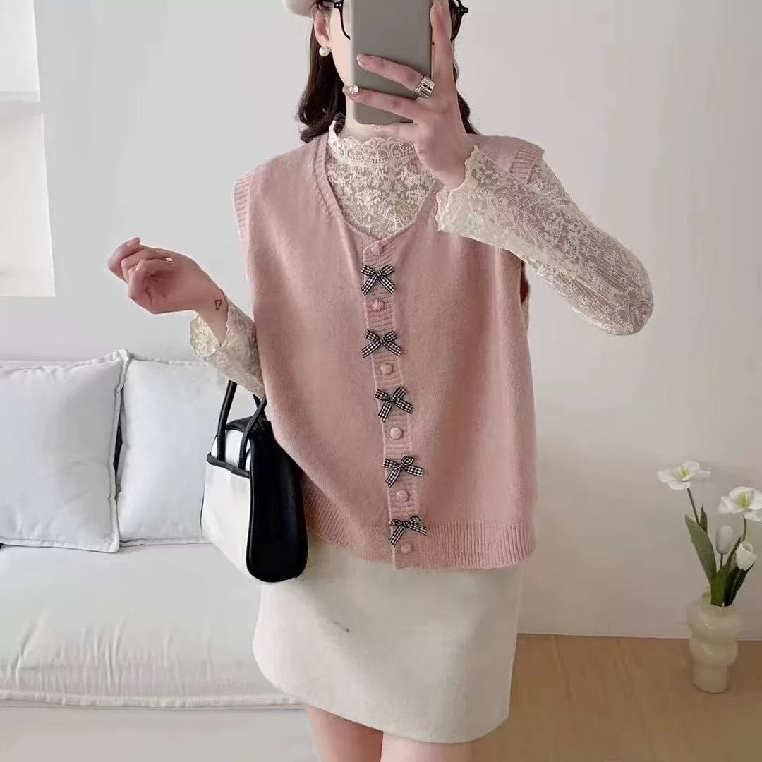 Pull en tricot tendance pour femmes avec grand col et nœuds décoratifs Chic und Stil