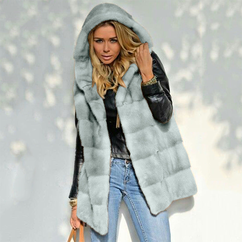 Gilet pour dames en polaire avec capuche Chic und Stil
