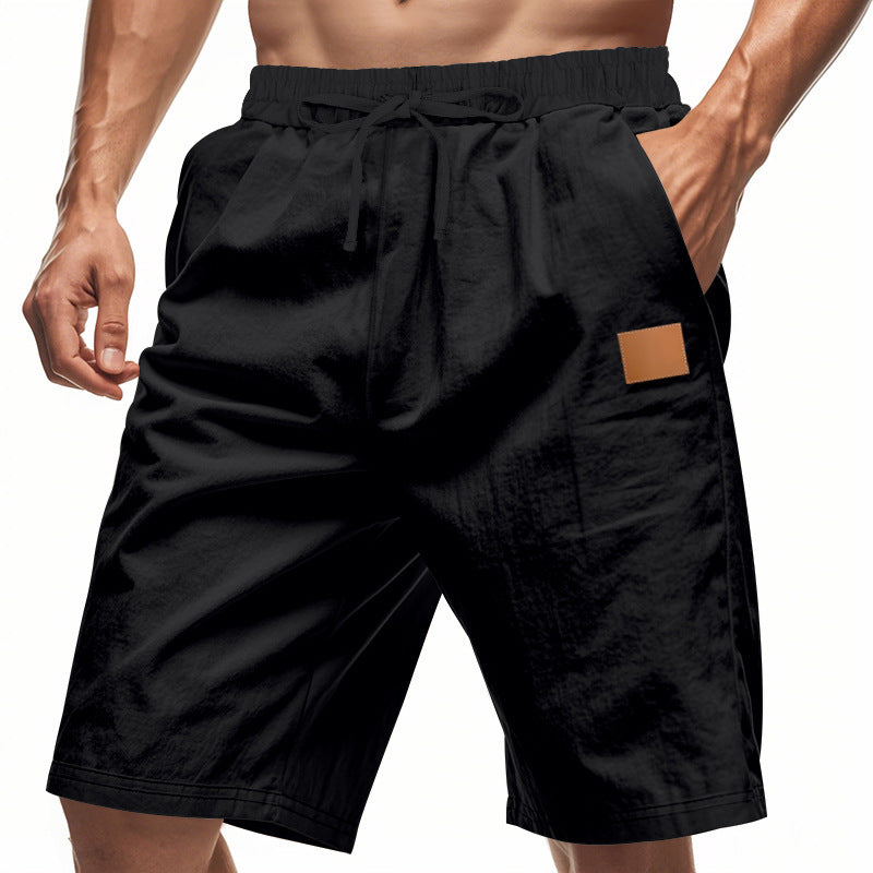 Shorts de sport décontractés pour hommes avec taille élastique et poches pratiques Chic und Stil