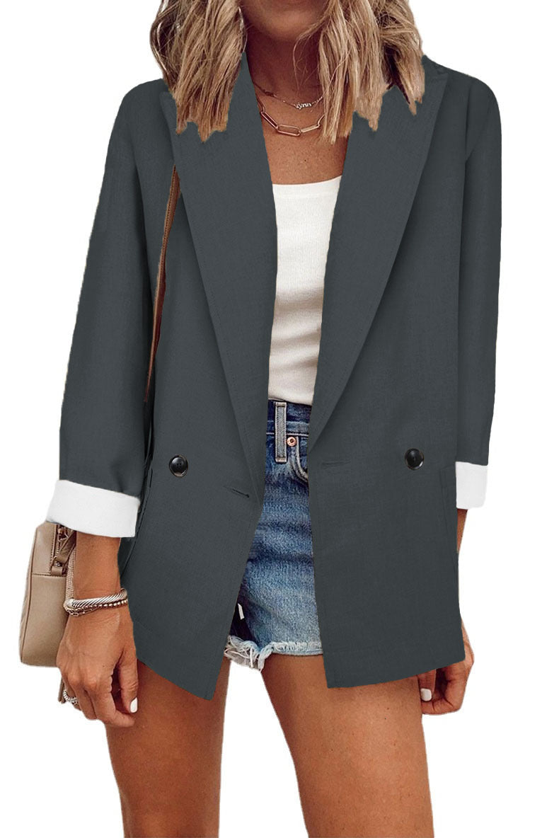 Veste oversized tendance pour femmes au design sobre avec des détails de boutons élégants Chic und Stil