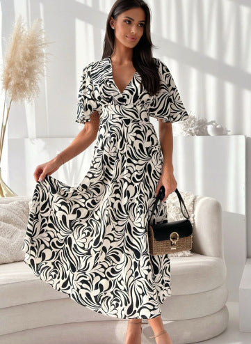 Robe maxi femme avec imprimé floral et manches papillon Chic und Stil