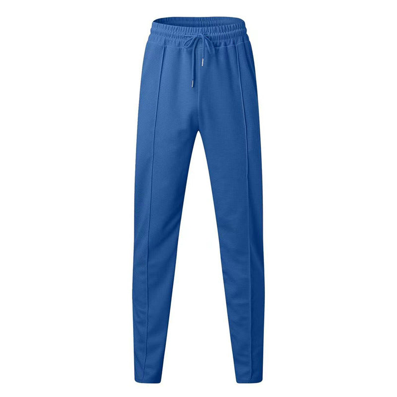 Pantalon de jogging sportif pour hommes avec taille élastique et poches zippées Chic und Stil