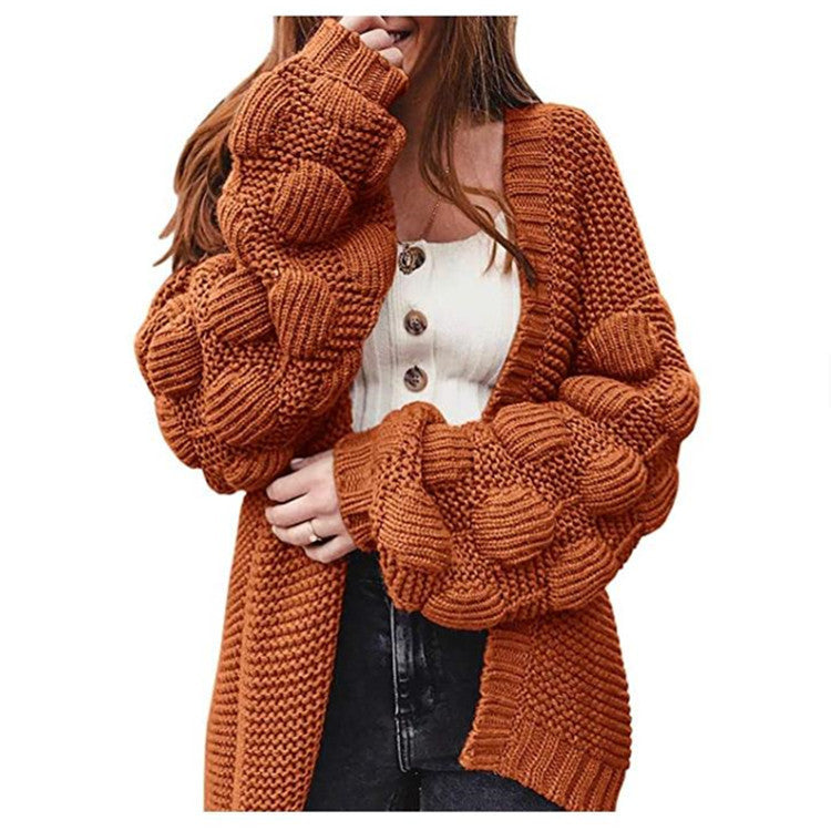 Veste en tricot pour femmes avec des manches bouffantes volumineuses et un aspect de maille structuré Chic und Stil