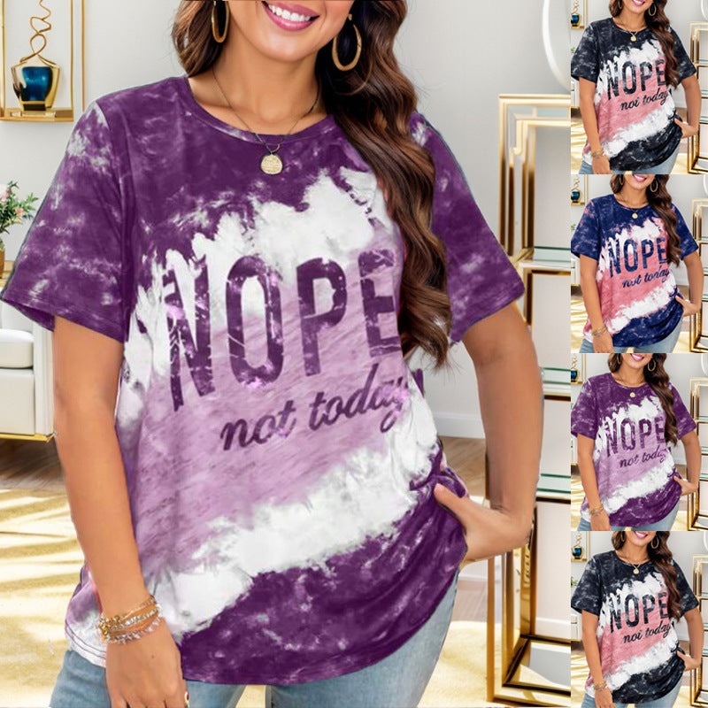 T-shirt décontracté pour femmes avec un motif de batik créatif et un lettrage accrocheur Chic und Stil