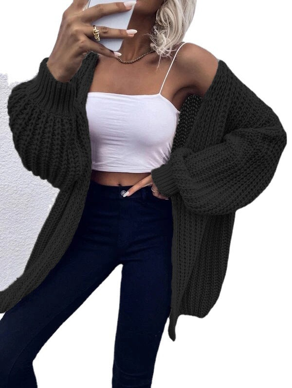 Cardigan en tricot épais pour femmes avec des manches volumineuses et une ouverture à l'avant Chic und Stil